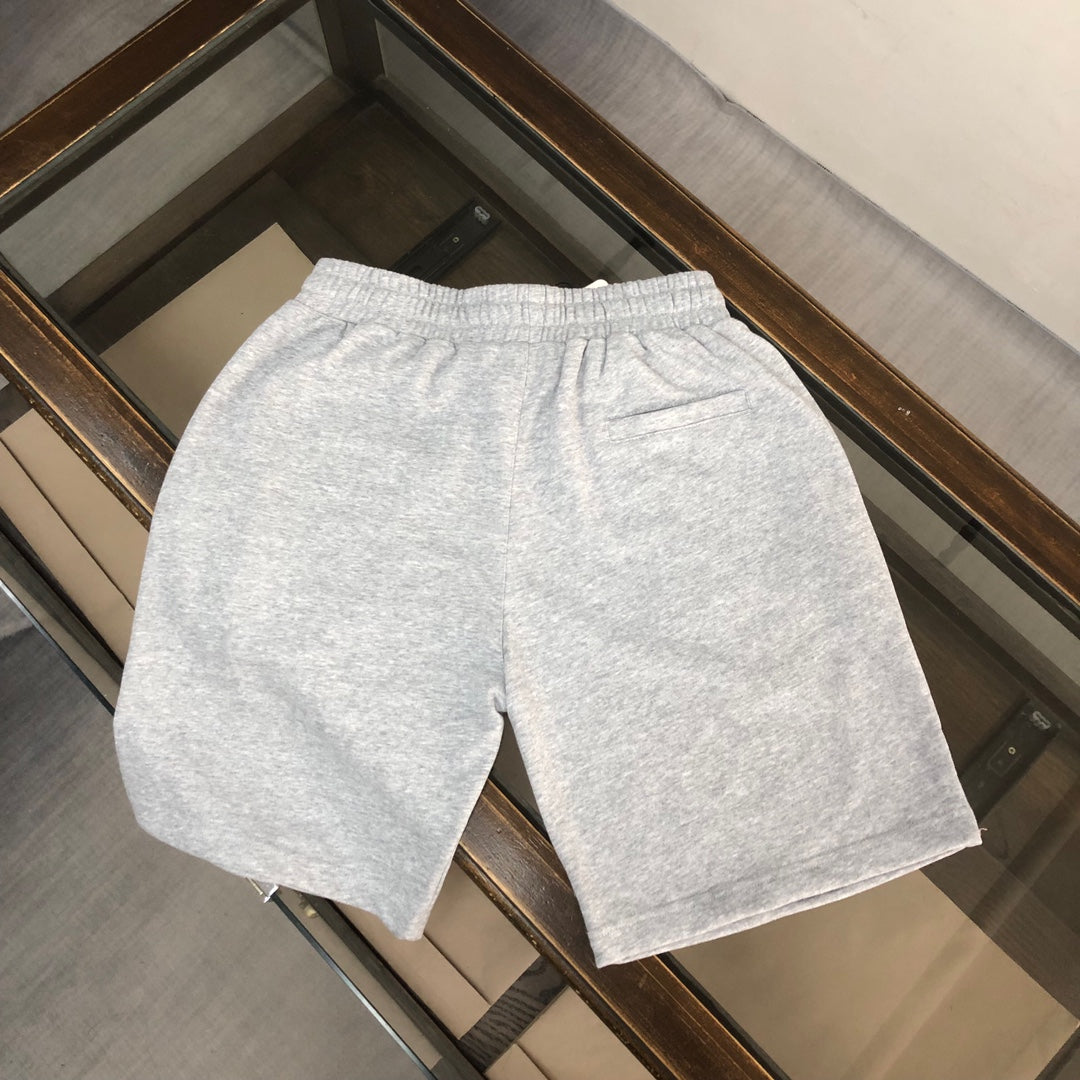 Heather gray shorts with elastic waistband, back view.