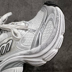Unisex luxury sneaker side close-up in silver with layered cushioning details