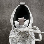 Unisex luxury sneaker open collar view in silver with white laces and black label