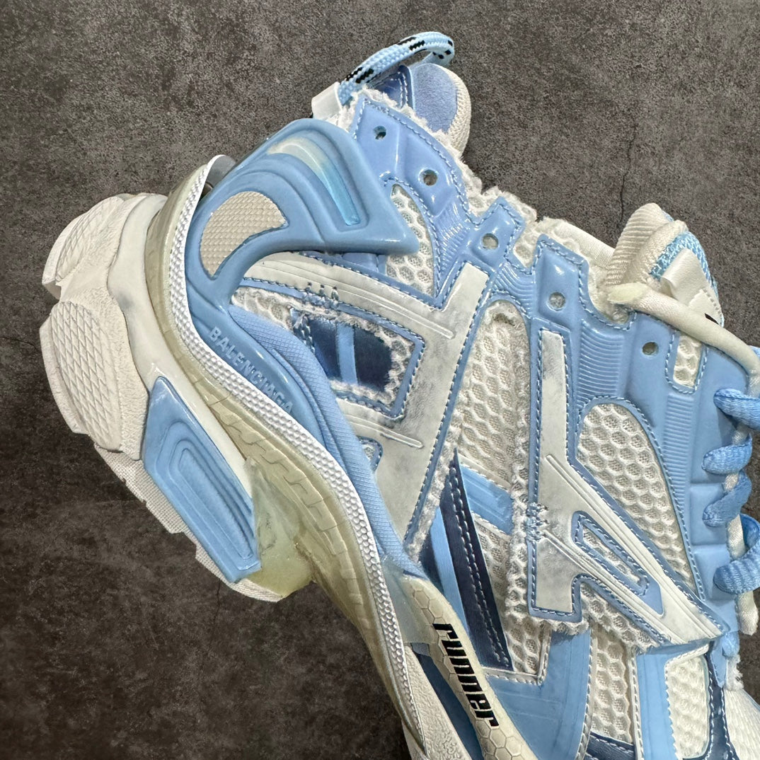 Balenciaga unisex sneaker side view in blue and white with lace-up and cushioned sole
