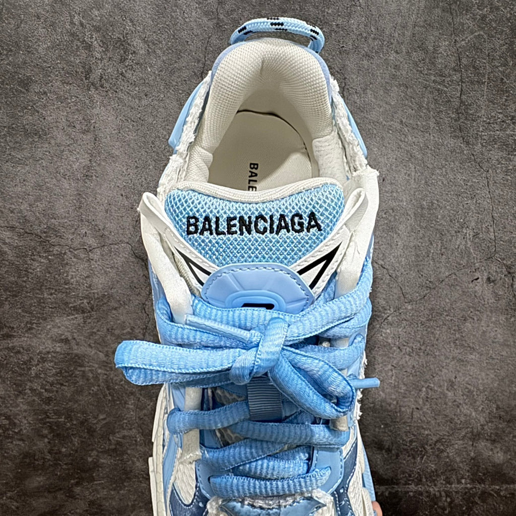 Balenciaga unisex sneaker back view with “BALENCIAGA” logo and tied blue laces