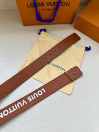 Louis Vuitton belt strap shown flat with brown embossing and silver-tone buckle