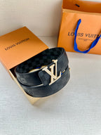 Louis Vuitton belt with dark blue checkered canvas and silver-tone LV buckle on dark strap