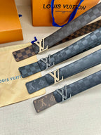 Louis Vuitton belts with dark checker straps and LV buckles, multiple end tabs