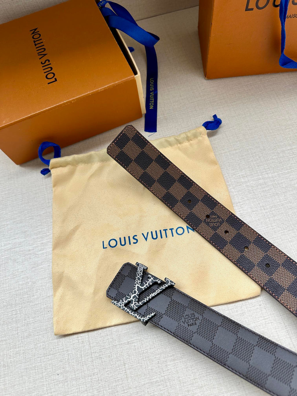 Louis Vuitton belt strap with dark checker pattern and metallic LV buckle detail