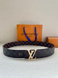 Louis Vuitton belt with dark check pattern and metallic LV buckle, visible holes