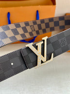 Louis Vuitton belt with dark checker strap and gold-tone LV buckle detail