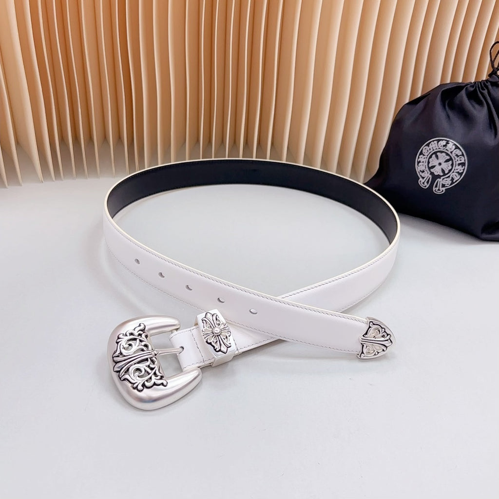 White leather belt with silver decorative buckle and belt eyelets