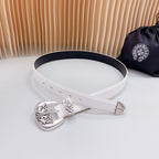 White leather belt with silver decorative buckle and belt eyelets