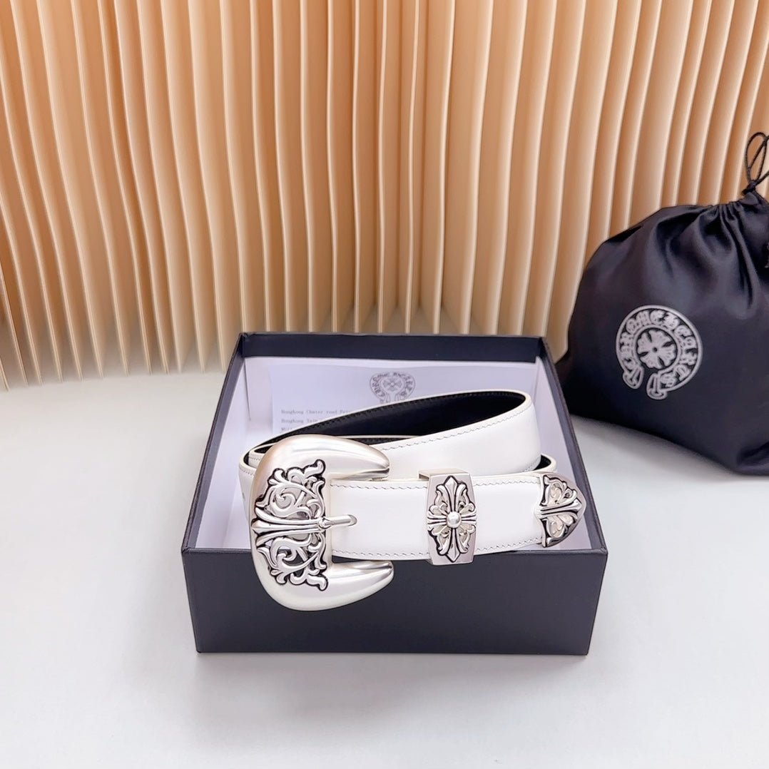 White leather belt with silver buckle and ornate centerpiece plate