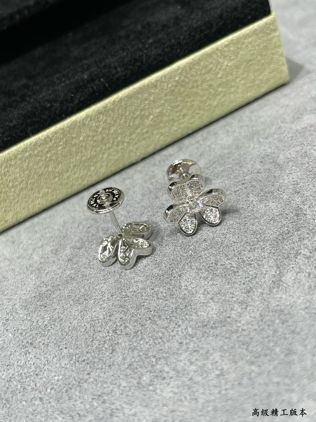 Four-leaf clover stud earrings in silver-tone with clear stones