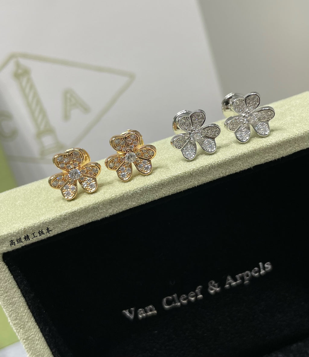 Four-leaf clover stud earrings with gold-tone and clear stones