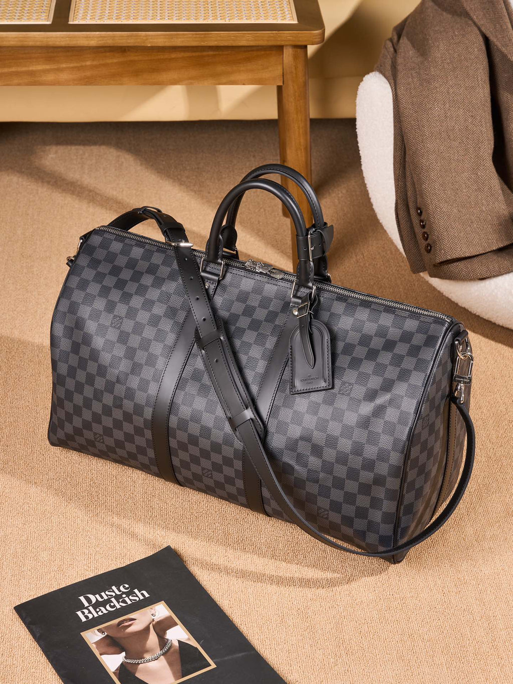 Men's Louis Vuitton checkered duffel bag with two top handles and crossbody strap