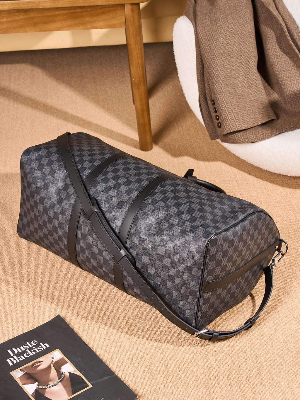 Men's Louis Vuitton checkered duffel bag with side panel zipper and shoulder strap