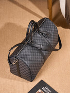 Men's Louis Vuitton checkered duffel bag with luggage strap and shoulder handle