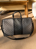 Men's Louis Vuitton duffel bag with monogram canvas and black leather center panel