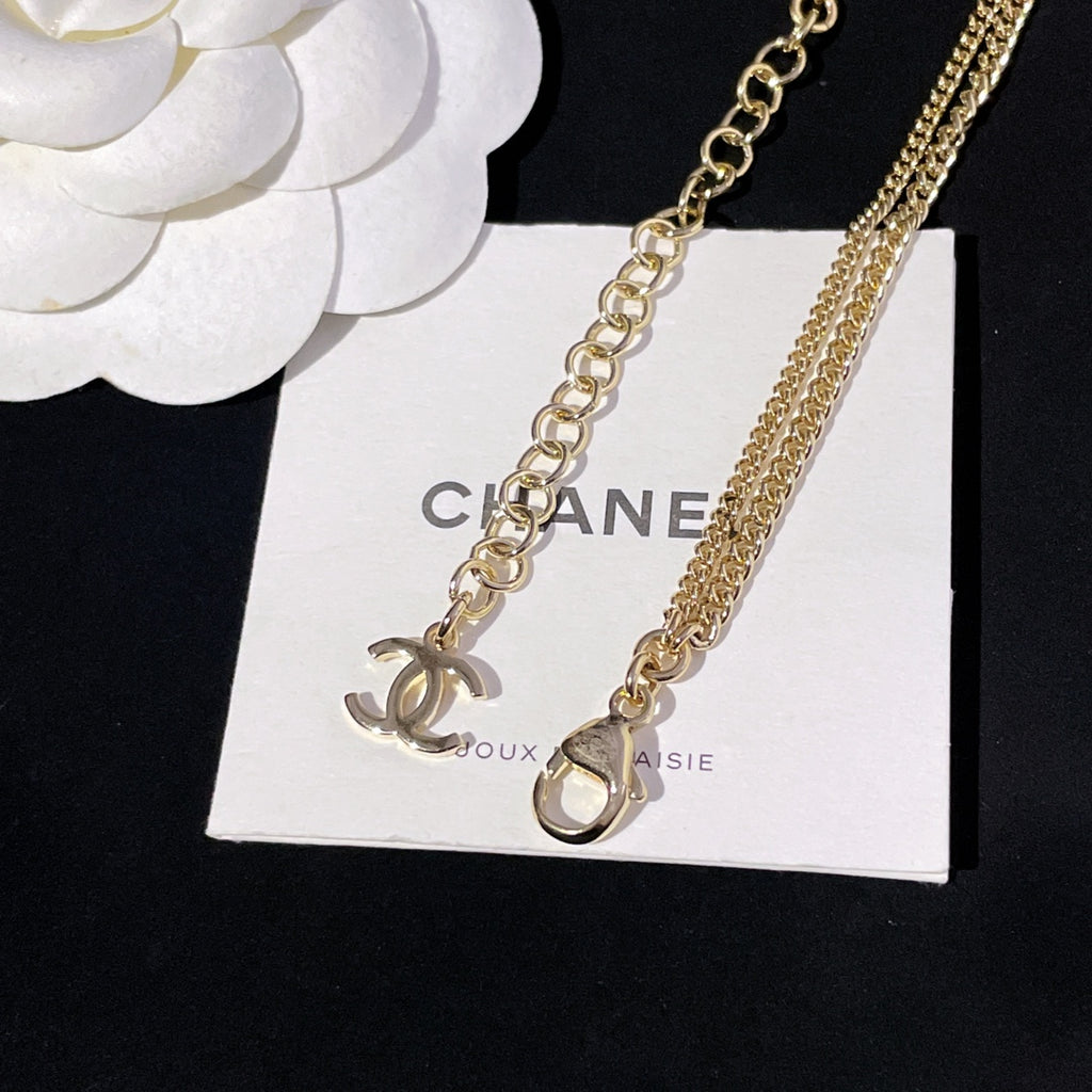 Gold-tone link necklaces with CC pendant and small heart-shaped charm