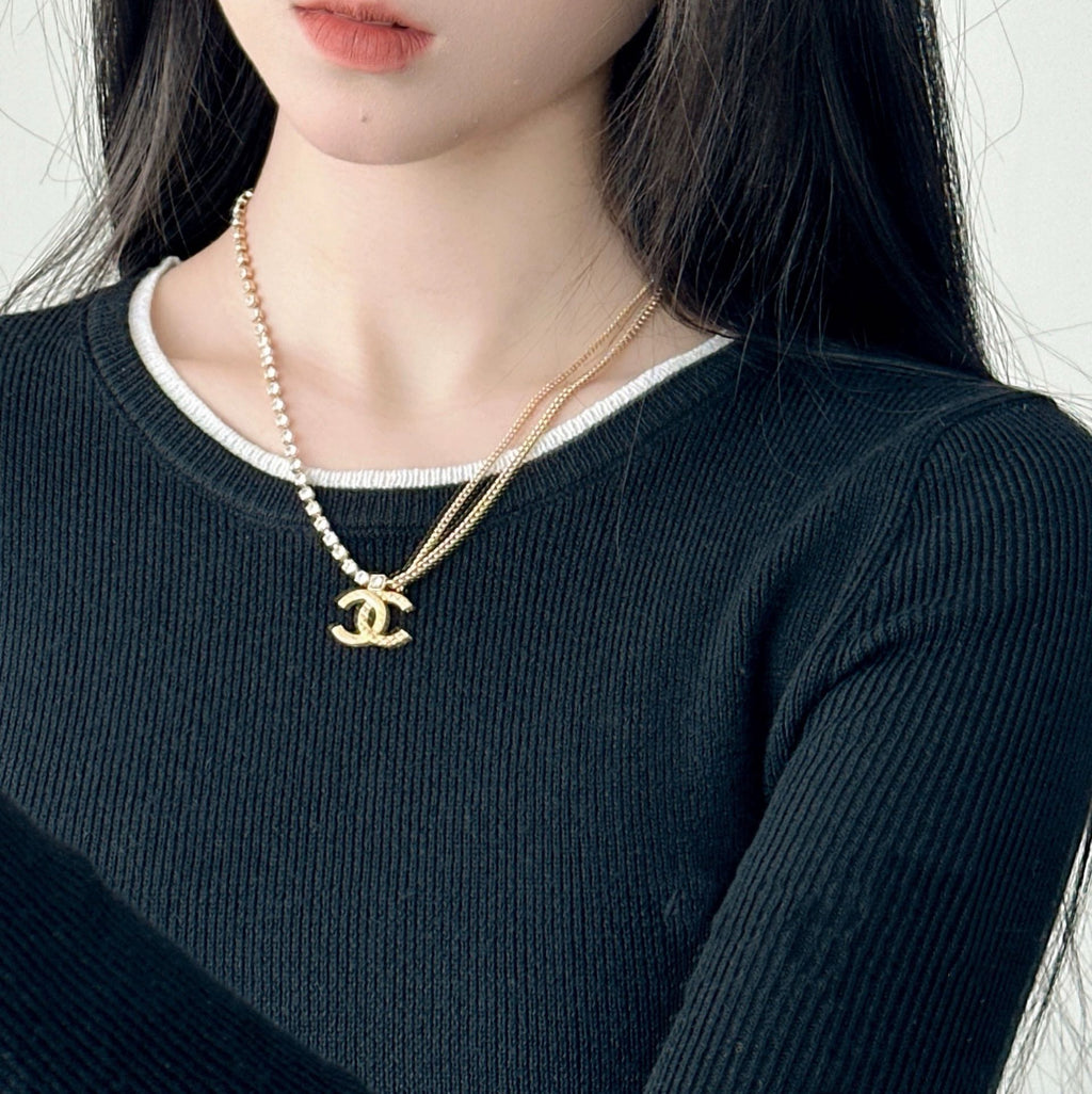Pearl-bead layered necklace with Chanel logo pendant, gold-tone chain