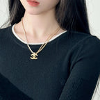 Pearl-bead layered necklace with Chanel logo pendant, gold-tone chain
