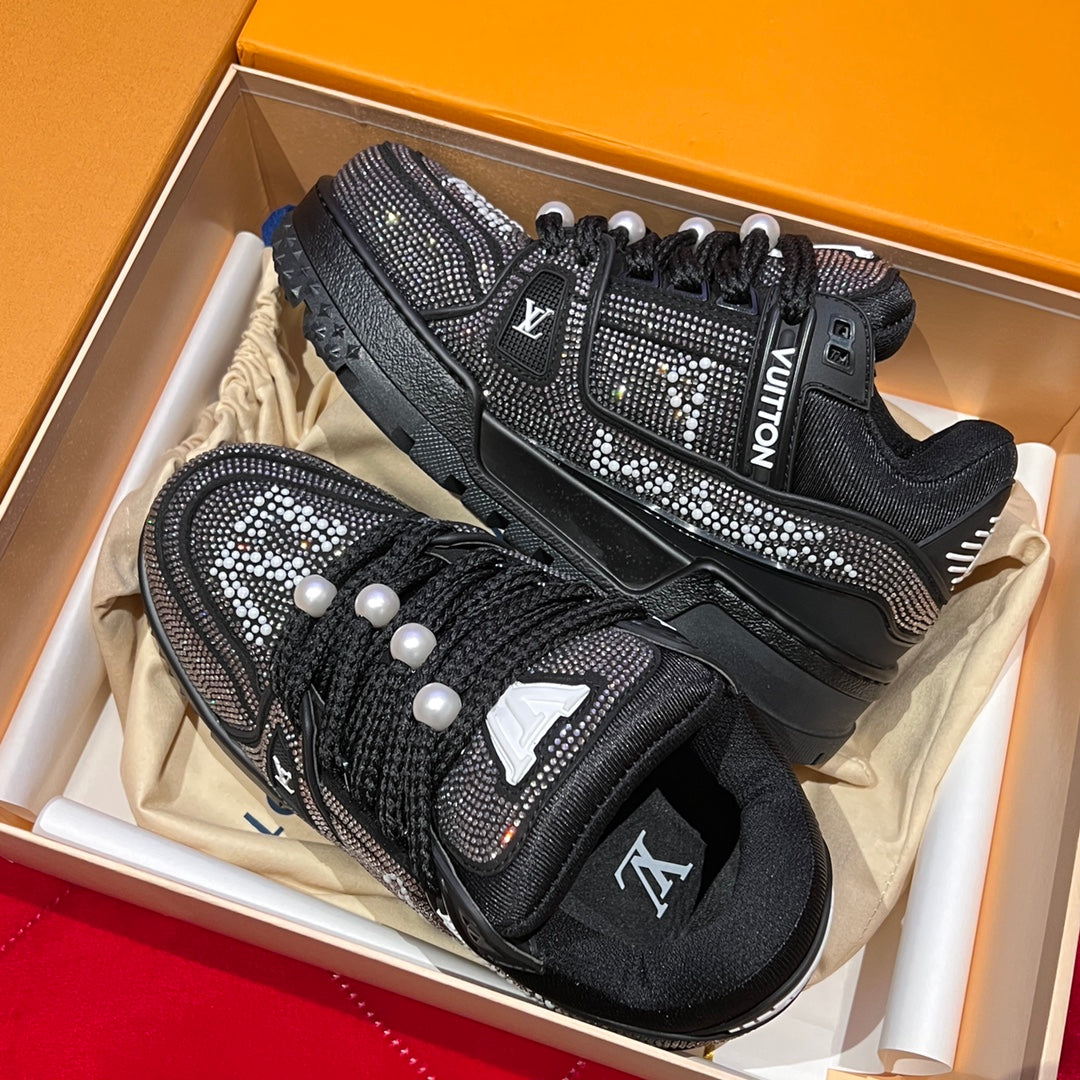 Black Louis Vuitton lace-up sneakers with rhinestone vamps and padded tongues
