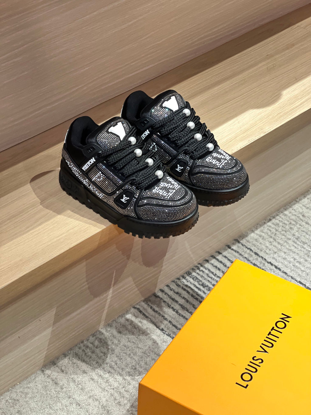 Pair of black Louis Vuitton lace-up sneakers with sparkling crystal uppers
