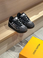 Pair of black Louis Vuitton lace-up sneakers with sparkling crystal uppers