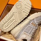 Louis Vuitton trainer sneakers outsole view, white tread pattern with side logo