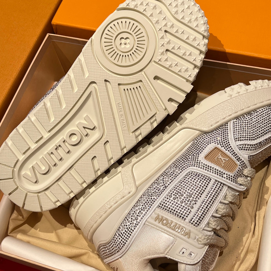 Louis Vuitton trainer sneakers outsole view, white tread pattern with side logo