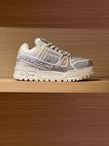 Silver-and-gray Louis Vuitton trainer sneakers with studded mesh panels and white sole