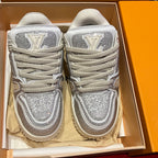 Louis Vuitton trainer sneakers with silver mesh uppers, 'LV' heel logos, and lace-up design