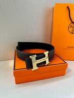 Hermes leather belt, dark leather with silver buckle, close front view
