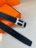 Hermes reversible-style belt, dark navy leather with silver buckle and multiple holes