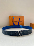 Louis Vuitton monogram belt with dark blue strap and gold-tone LV buckle.