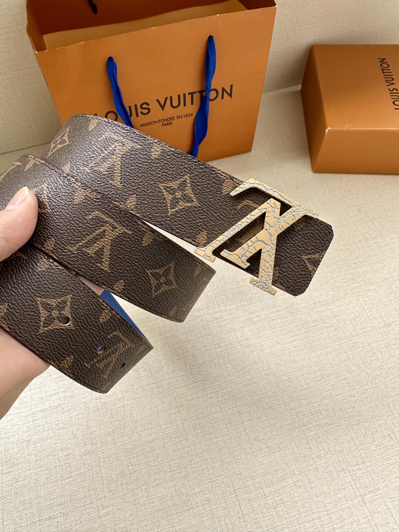Monogram canvas belt, dark brown with LV buckle and visible adjustment holes