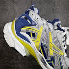 White, blue, and neon yellow sneakers, top and lateral view with thick sole
