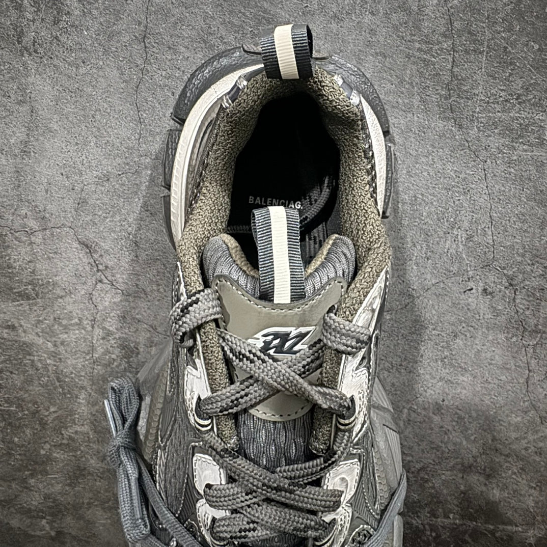 Gray and white sneaker interior and laces visible, with cushioned collar lining