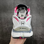 White and pink unisex sneakers, back view with black heel lining and size tag 39