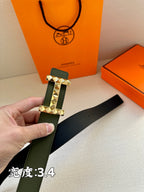 Hermes belt dark green leather with silver-tone studded buckle and visible strap edge