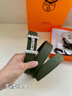 Hermes belt dark green leather with silver-tone studded H buckle and strap holes