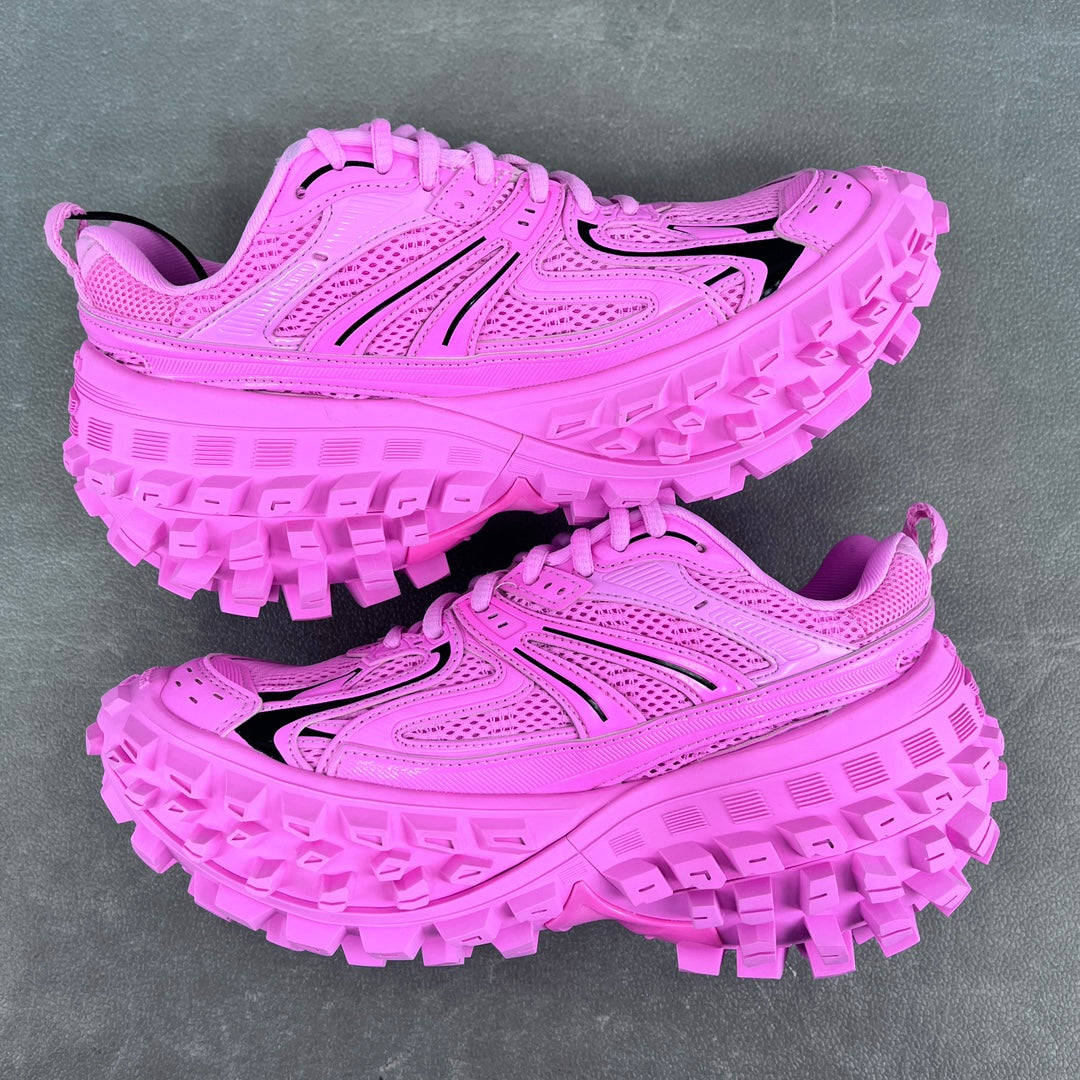 Balenciaga unisex sneakers pair view, bright pink upper with black stripes and lug sole