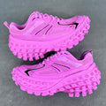 Balenciaga unisex sneakers in bright pink with black accents and chunky tread soles