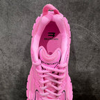 Pink lace-up sneaker with rear collar branding and padded heel