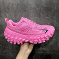 Pink lace-up sneakers with thick geometric tread sole, Balenciaga logo on side