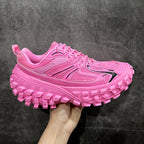 Pink lace-up sneakers with thick geometric tread sole, Balenciaga logo on side