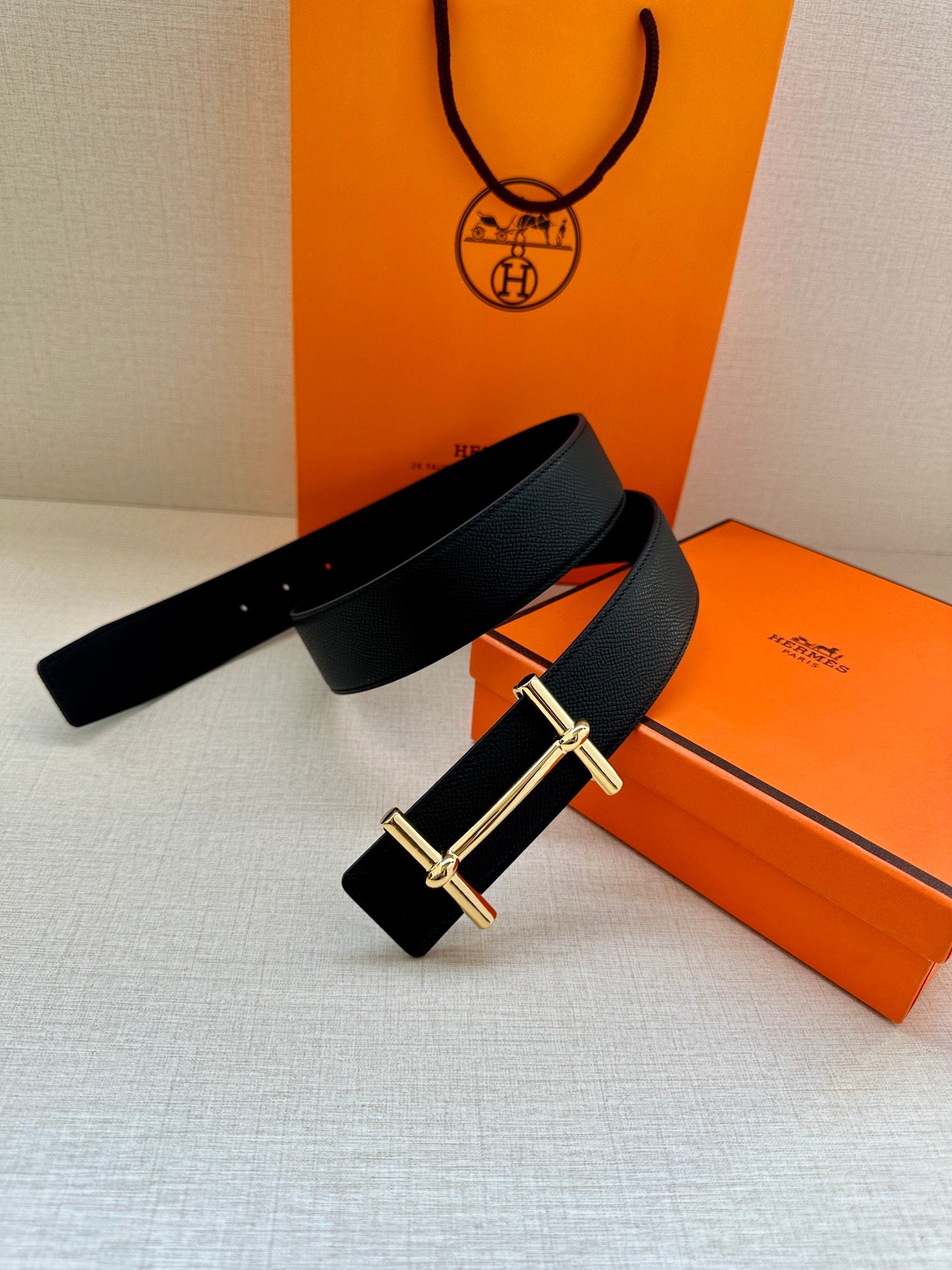 Hermes belt, black leather with gold rectangular buckle and pin closure