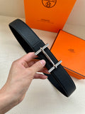 Hermes belt, black leather with silver double-prong buckle, textured strap