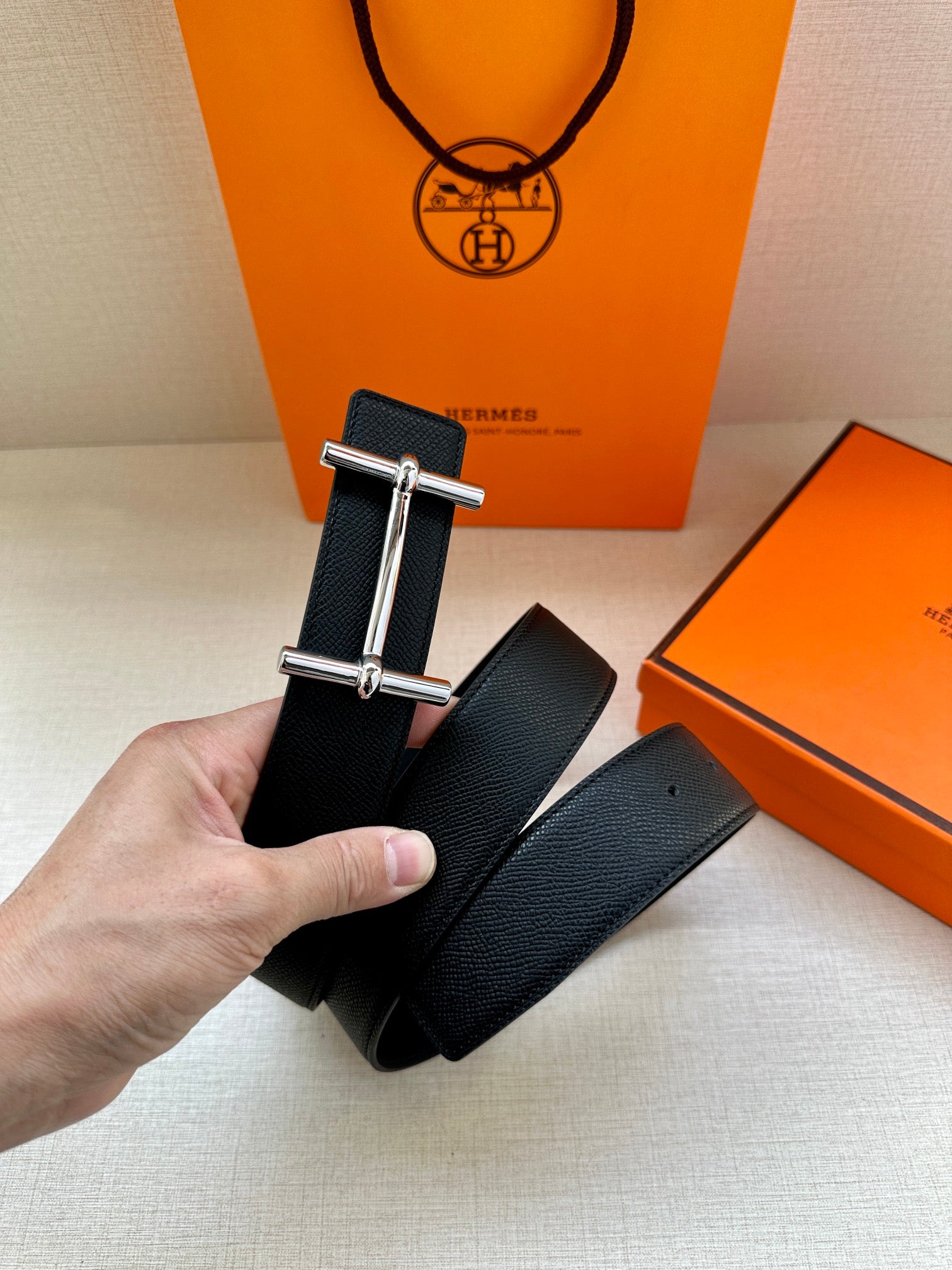 Hermes belt, black textured leather with silver double-prong buckle