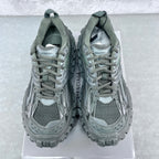 Balenciaga unisex trail shoes with padded collars, lace-up mesh uppers, muted green.