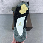 Olive and navy high-top sneaker outsole view with gold Jumpman logo