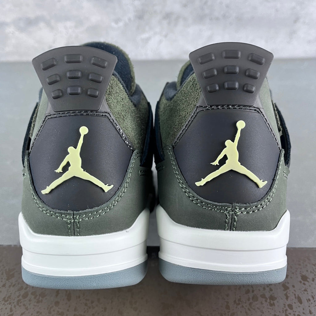 Olive and navy high-top sneakers with heel Jumpman emblems and white sole
